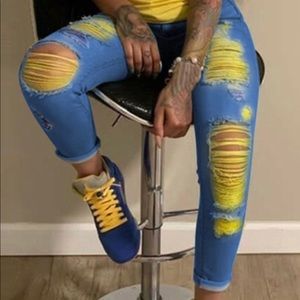 Very trendy distressed jeans trimmed in yellow